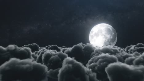 full moon above dark clouds at night