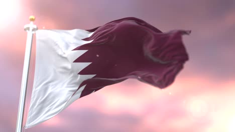 qatar flag waving at wind in slow at sunset, loop