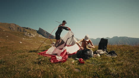 couple camping in the mountains