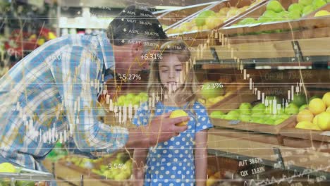 financial data processing against dad and daughter shopping in grocery store