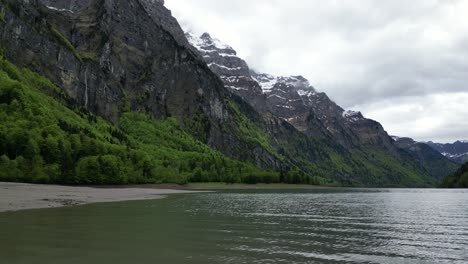 Drone-view-of-the-lake-in-Gäsi-Betlis,-Walensee-Glarus,-Weesen-Walenstadt,-Switzerland