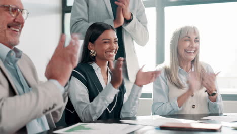 business team celebrating success with applause