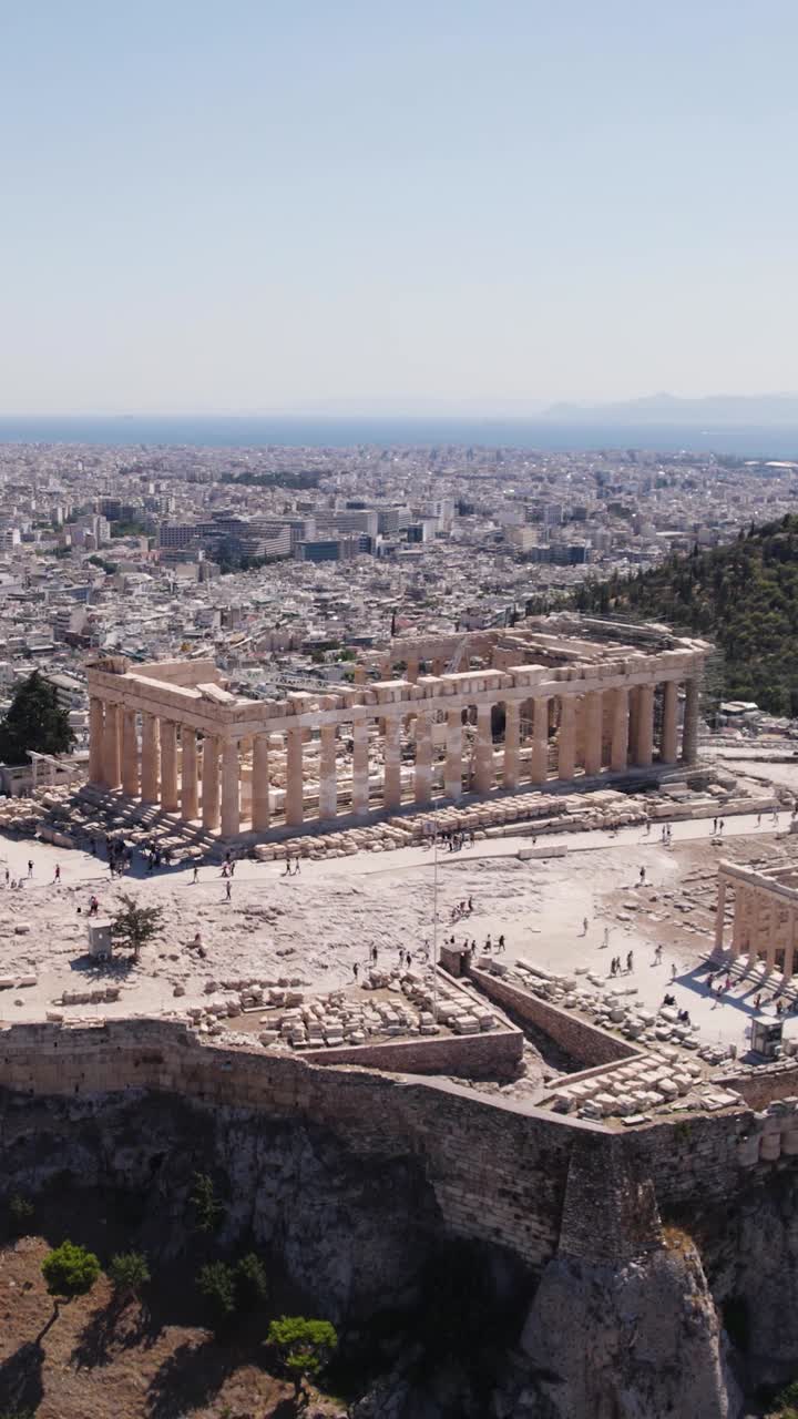 Ancient Parthenon atop Acropolis in Athens Greece. Vertical drone