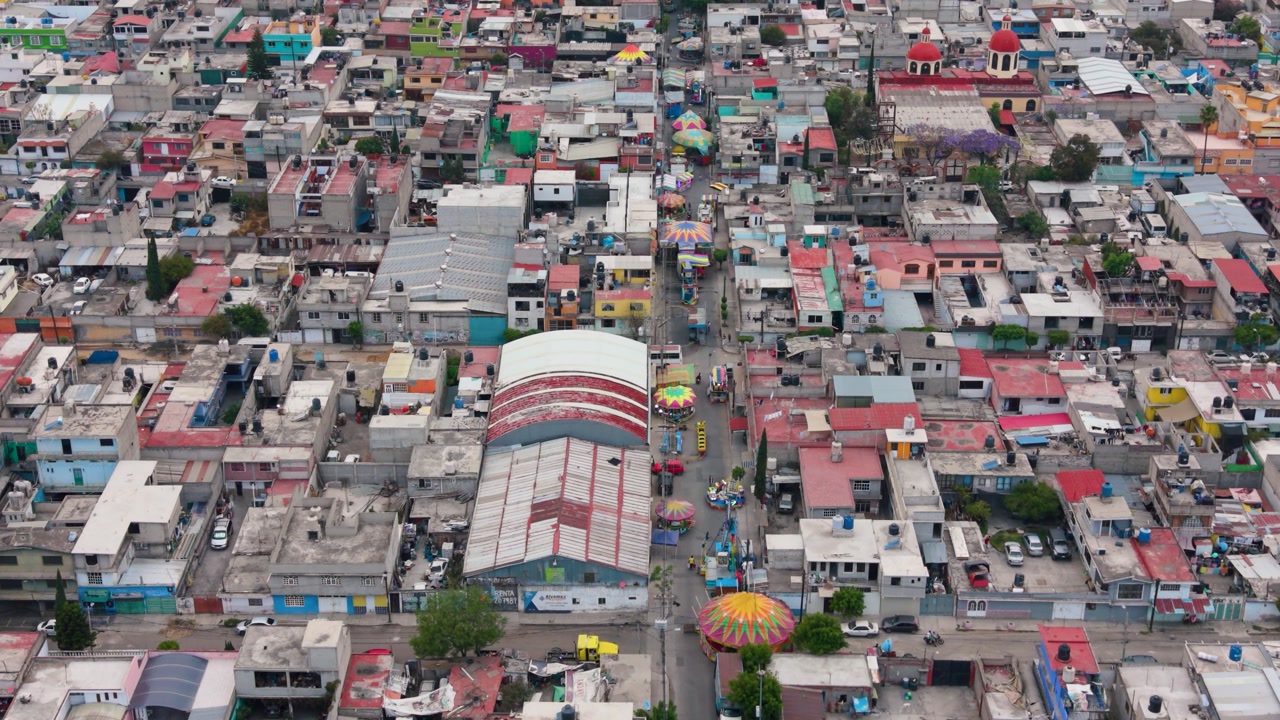 Aerial footage of community fair in urban area of Ecatepec
