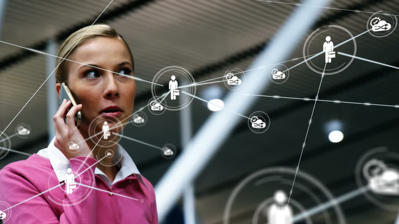 animación de una red de conexiones con iconos sobre una mujer de negocios caucásica hablando por teléfono inteligente