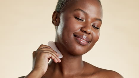 Black-woman,-face-and-facial-gua-sha