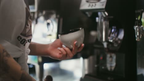 woman preparing coffee drinks