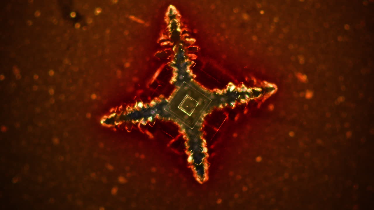 Microscopic Crystal Formation with Symmetrical Glow