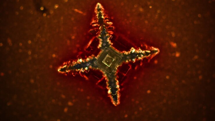 Microscopic Crystal Formation with Symmetrical Glow