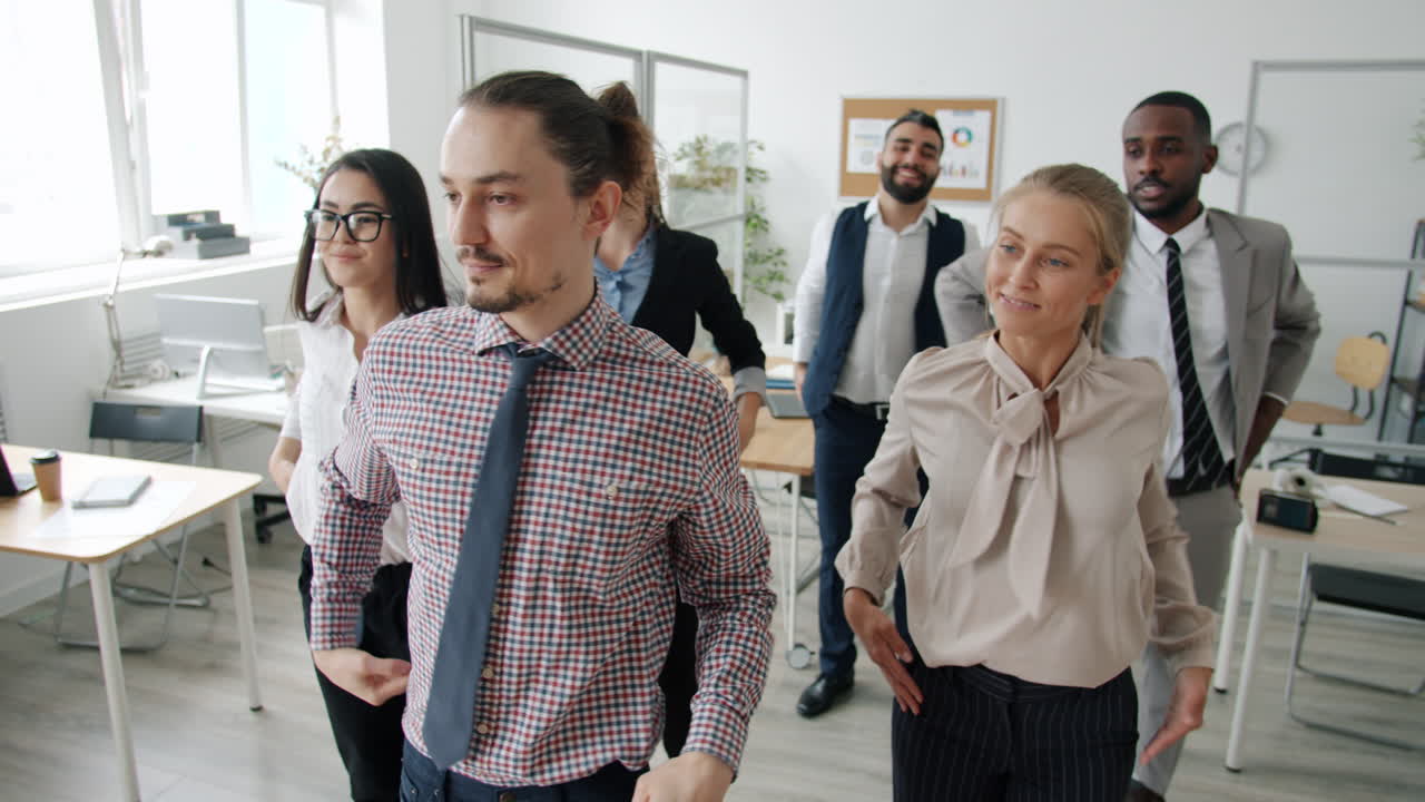 Happy Office Team Dancing