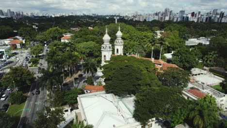 aerial view circling the igreja nossa senhora do brasil, in sunny sao paulo