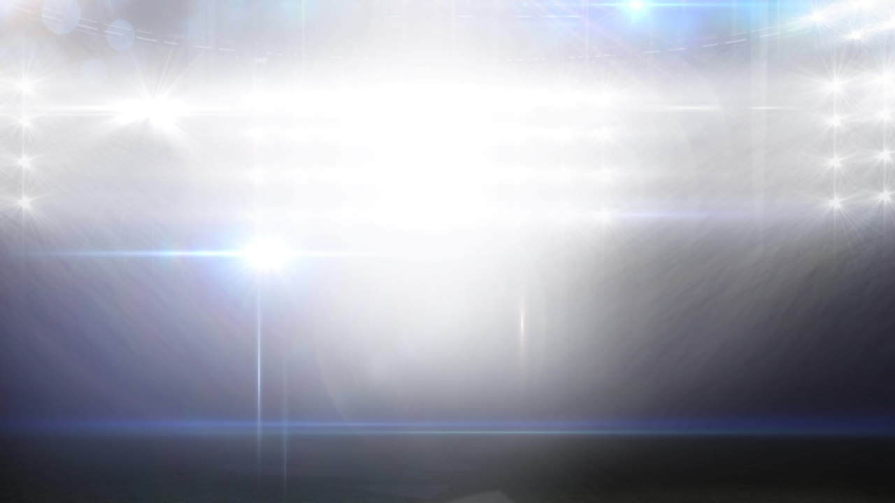 홍수 조명 스포츠 경기장에서 흐릿한 움직이는 불빛과 보케 빛 반점의 애니메이션