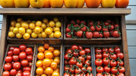 fresh produce display with colorful fruits and vegetables on sale