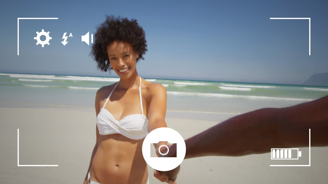 tomando fotos de una pareja con una cámara digital