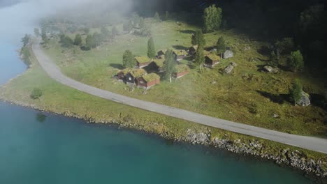 Lovatnet-glacier-lake-and-Breng-seter-historical-farm-houses