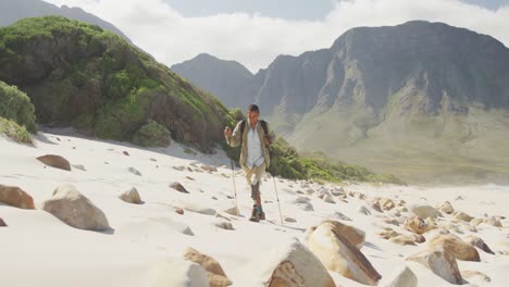 Sporty-mixed-race-man-with-prosthetic-leg-hiking