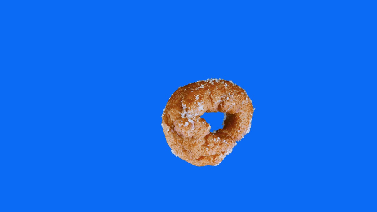 rosquilla flotante separada del fondo azul