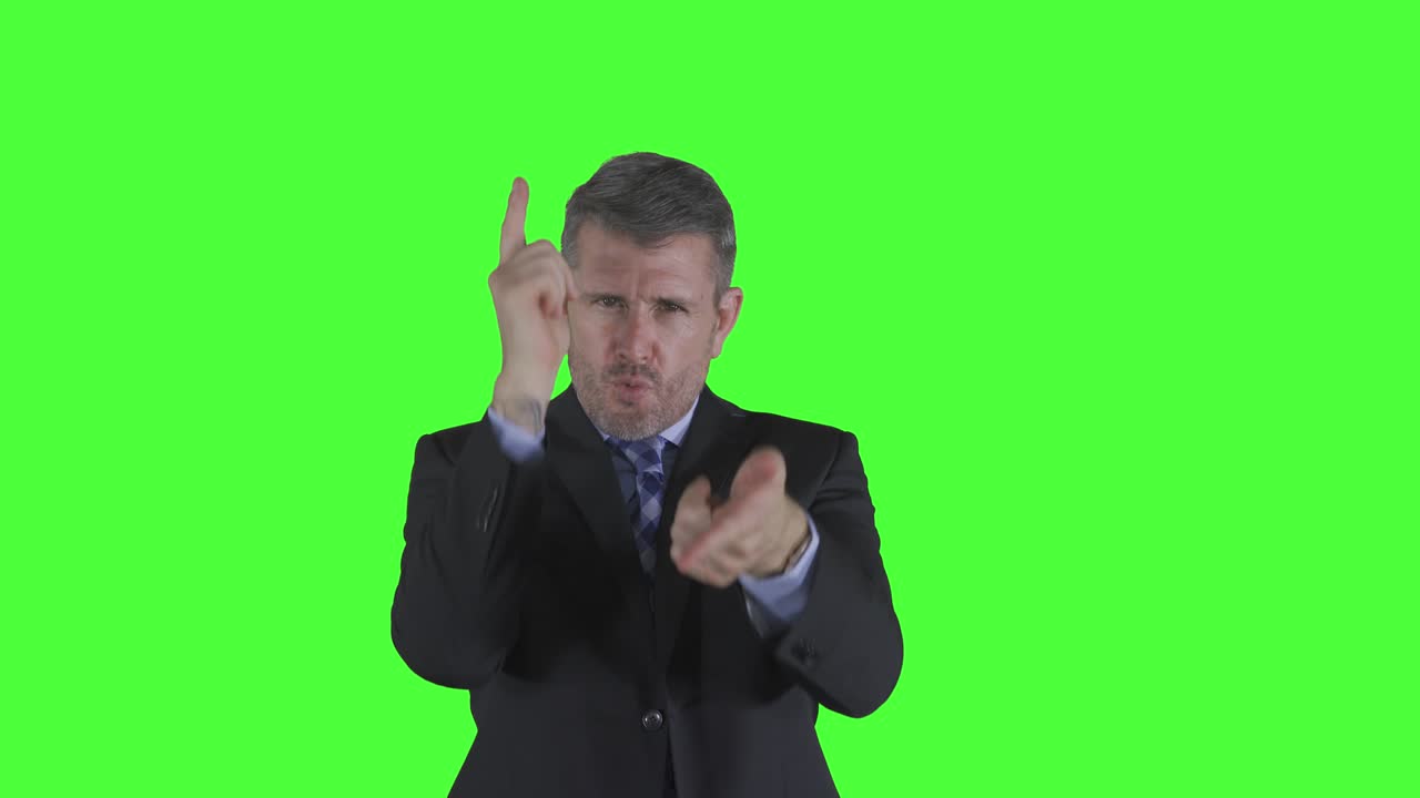 총을 는 몸짓을 하는 사업가