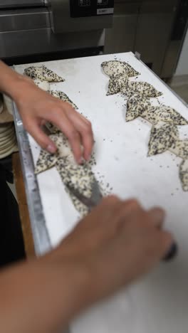 preparing sesame seed pastries