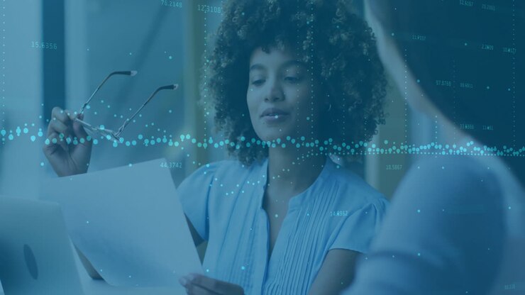 Animation of financial data processing over diverse colleagues discussing work in office