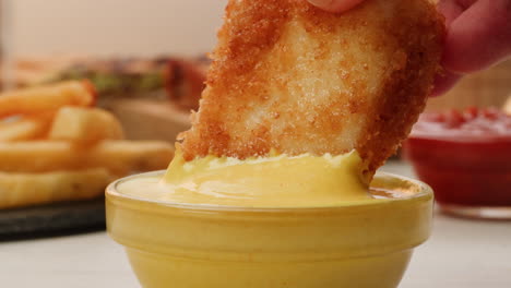 crispy fish fingers with mustard dip and fries