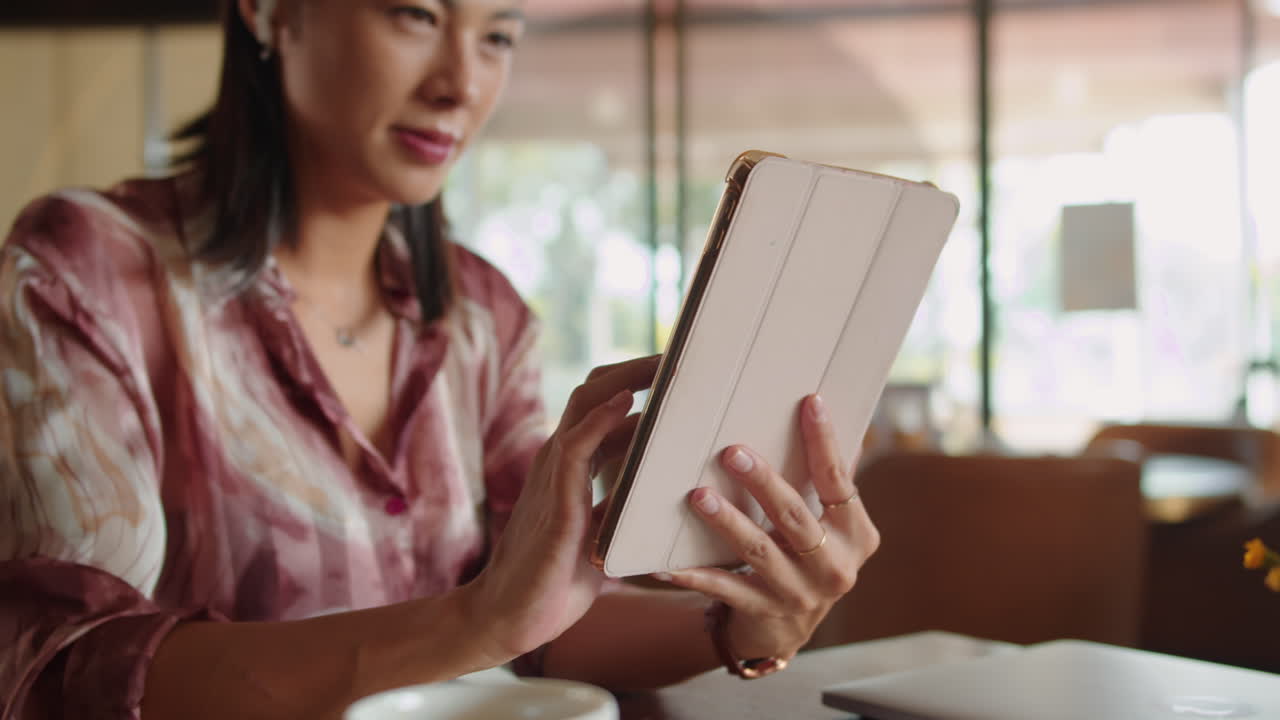 Successful Businesswoman Getting Good News Using Tablet