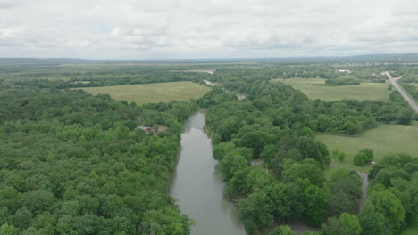 scenic view of a river stream with lush vegetation in mulberry, arkansas, usa
