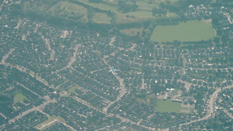 Aerial-footage-of-Embraer-190-aircraft-flying-over-London