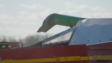 tractor trailer combine harvester, sunny day, slow motion