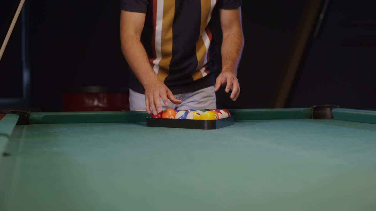 Man Playing Billiards