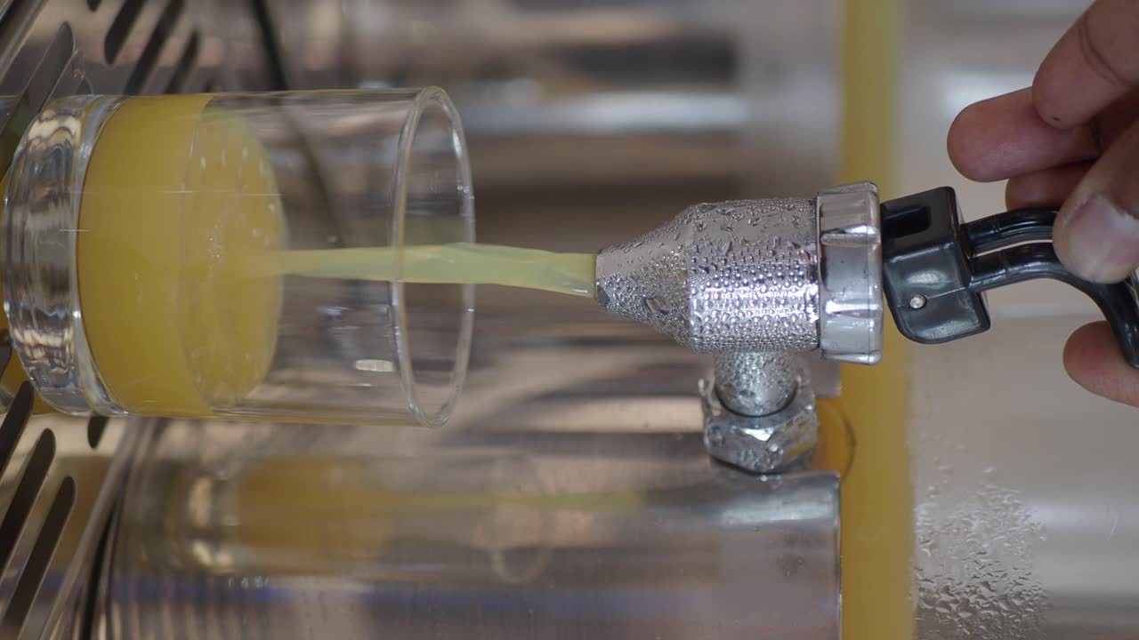 Juice pouring into glass