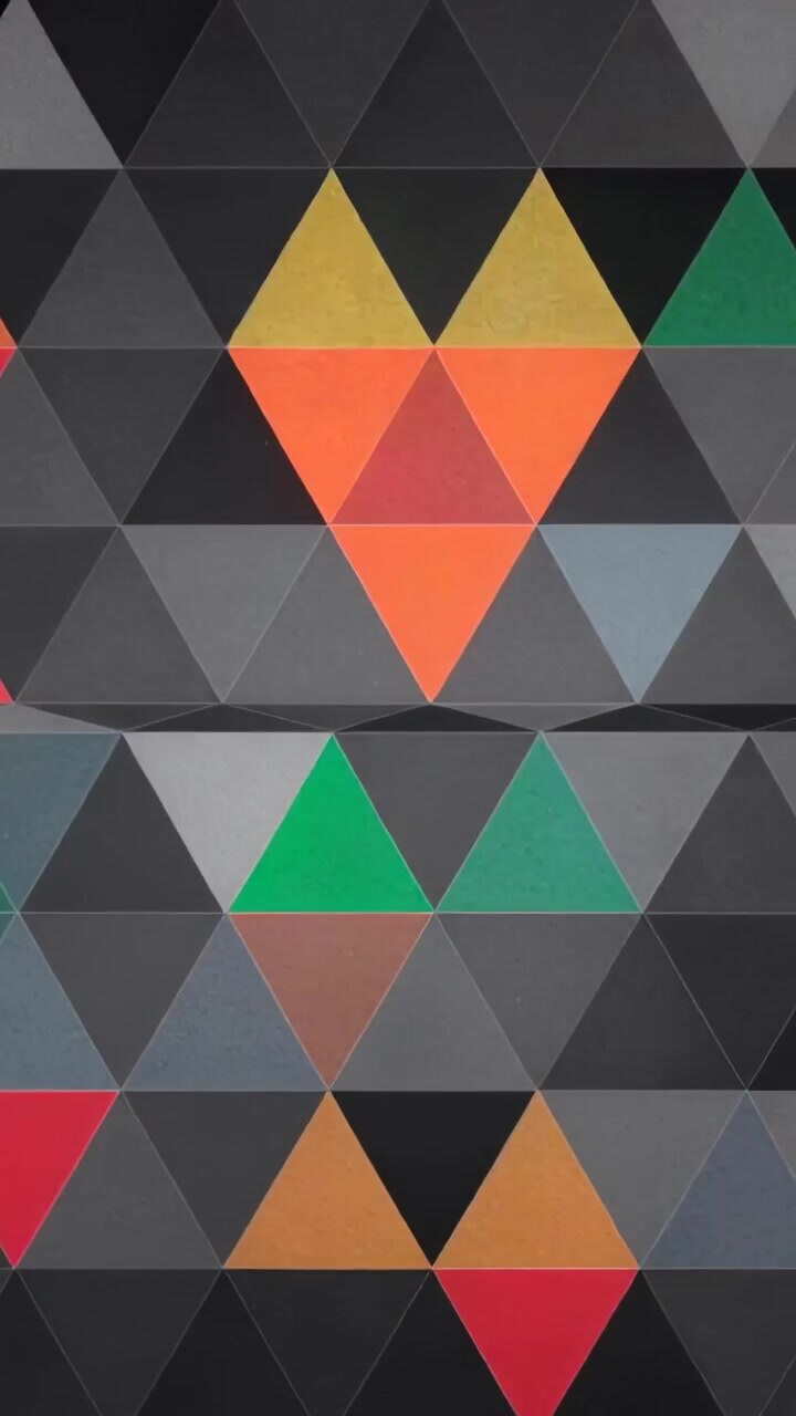 Vertical video: Pulsing tile grid on screen after light shift, showing green pink orange triangles