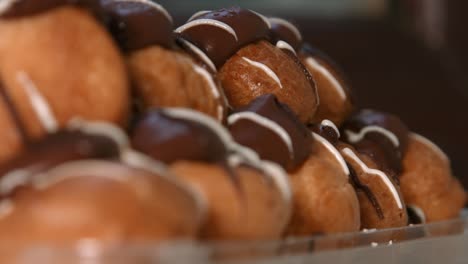 Cinematic-Dessert-Profiteroles-Choux-Pastry-with-Whipped-Cream-Filling-and-Chocolate-Top