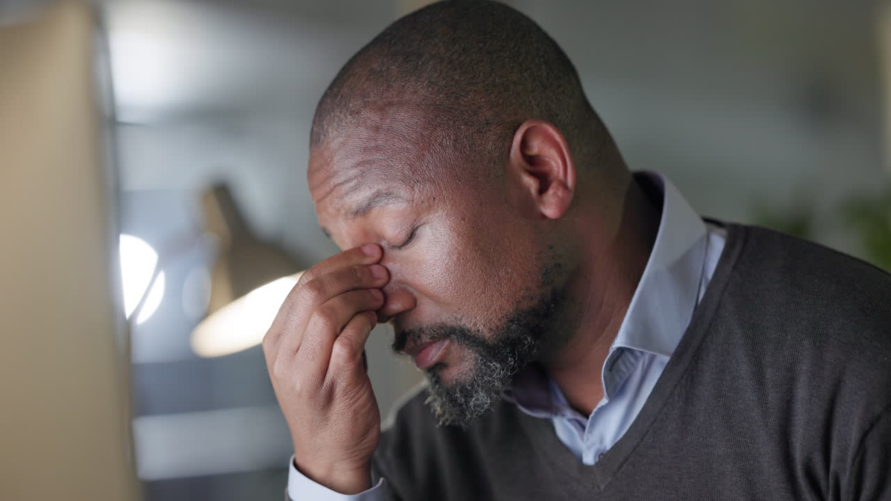Black man, senior and headache