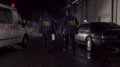 fbi agents at a night crime scene