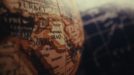 close-up of a vintage world globe, focusing on middle east