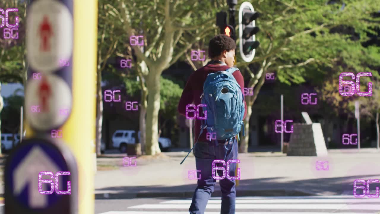 Animation of 6g texts over african american man walking