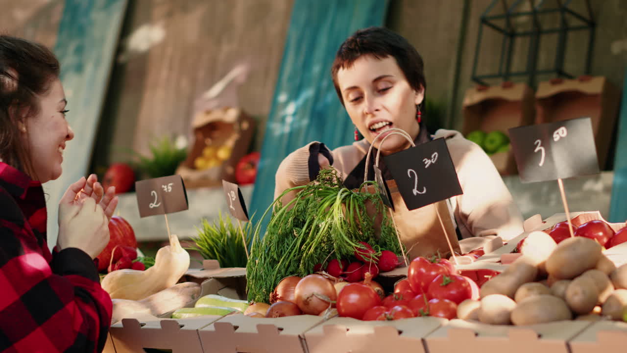 Customers buying produce at a local market