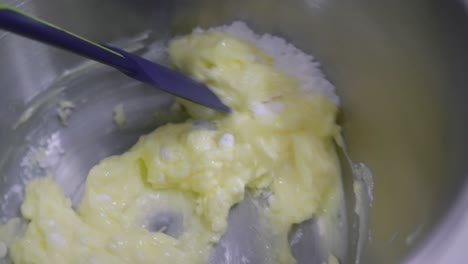 mixing baking ingredients with spatula