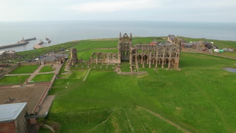 ruins of whitby abbey overlooking the sea, popular tourist attraction in north yorkshire, england