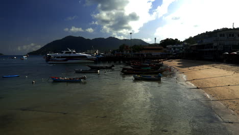 looking at small boats at the harbor in thailand