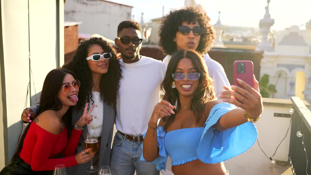 A group of friends enjoying a rooftop party