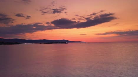 sunset-morning-ocean-dark-beach-view-clouds-golden-hour