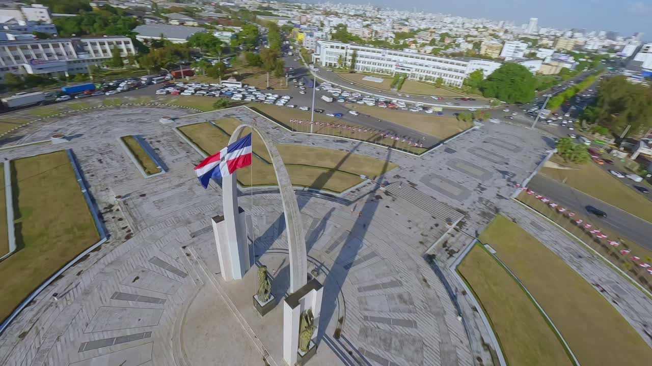 FPV Of Flag Square In Santo Domingo, Dominican Republic - aerial drone