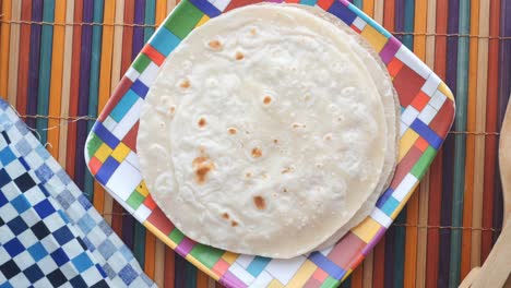 Homemade-roti-chapati-on-table-,