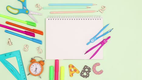 Back to school writing stationery move around copy space notebook. Stop motion