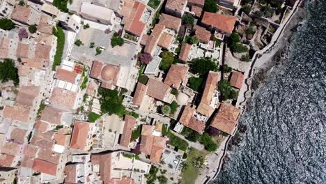 overhead drone view of the old town of monemvasia on a tied island off the east coast of the peloponnese, greece