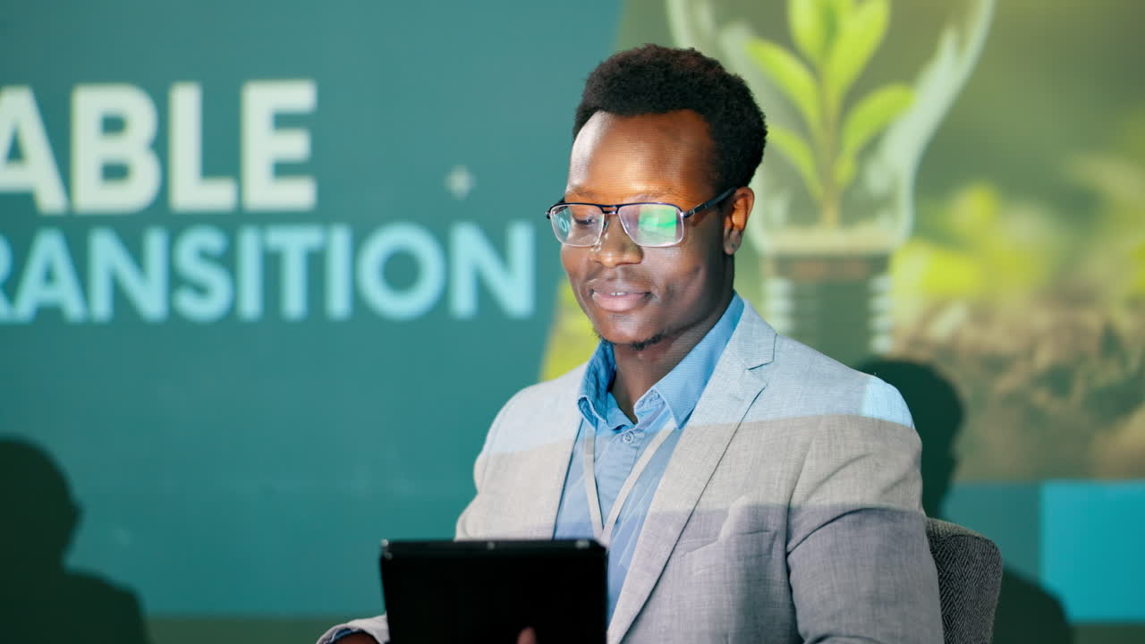 Man having makeup applied at conference