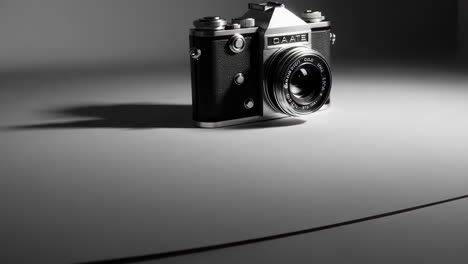 a vintage black and white film camera