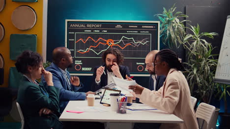 coworkers addressing innovation initiatives in research and development efforts